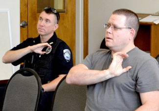 Police Officers Practicing Sign Language